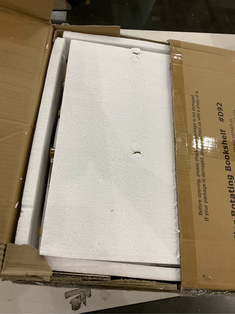 Condition photo showing New/Like New for APPOLYN 5 Tier Rotating Bookshelf, 360 Display Spinning Corner Bookshelf, Space-Saving Metal Frame Bookcase for Living Room, Office, Bedroom, Gold Gold 5 Tier