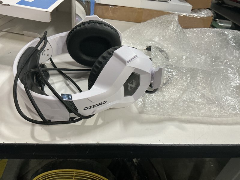 Condition photo showing As Is for ozeino 2.4ghz wireless gaming headset for pc, ps5, ps4 - lossless audio usb & type-c ultra stable gaming headphones with flip microphone, 40-hr battery gamer headset for switch, laptop, mobile, mac black and white