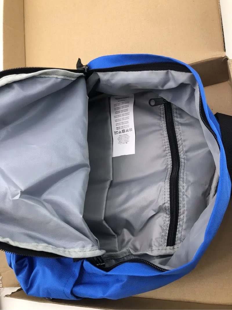 Condition photo showing As Is for amazon basics classic backpack, blue