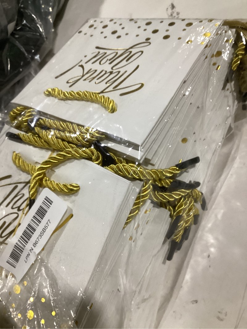 Condition photo showing Good Condition for eqoreiin small thank you gift bags 50pcs 5.5x2.5x4.7 inches small gift bags with handles bow ribbon white paper bags for party favor, mother's day?valentine's day, wedding, baby shower (white) white 50pcs