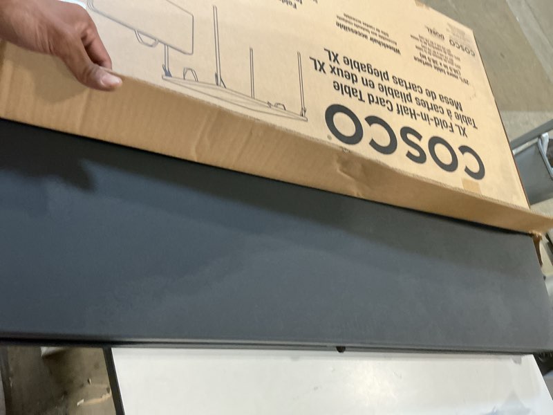 Condition photo showing Good Condition for coscoproducts cosco xl 38.5" fold-in-half card table w/handle, black, indoor & outdoor, wheelchair accessible