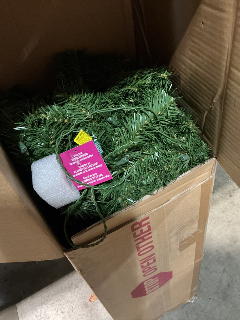 Condition photo showing As Is for national tree company 7.5 ft pre-lit north valley spruce slim artificial christmas tree, 400 clear lights, 1,088 tips, includes stand, green