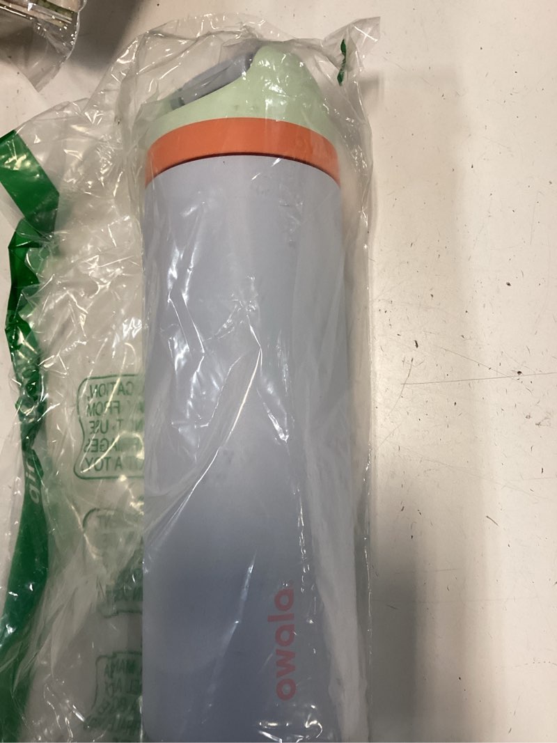 Condition photo showing New/Like New for Owala FreeSip Insulated Stainless Steel Water Bottle with Straw for Sports, Travel, and School BPA-Free Sports Water Bottle, 24 oz, Beach House Beach House 24 Ounces