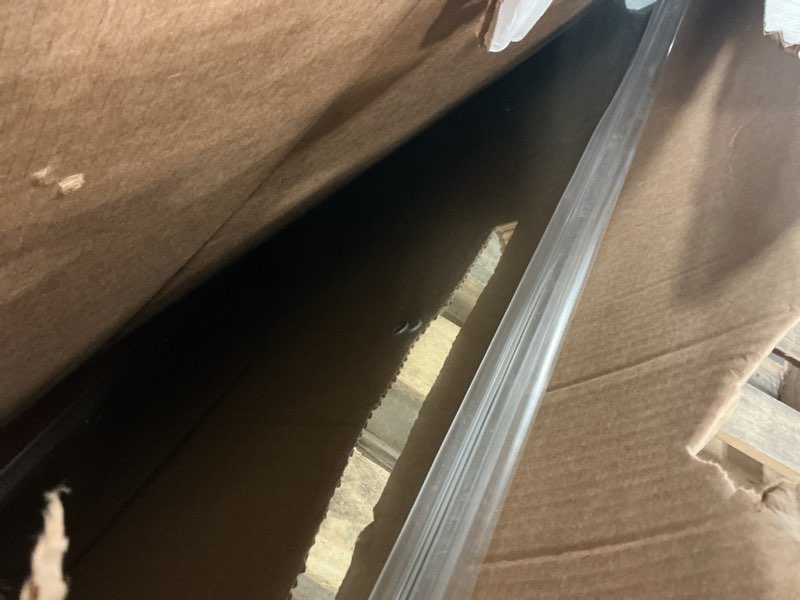 Condition photo showing As Is for kohler premise matte black 56-in to 60-in w x 61.75-in h frameless sliding soft close bathtub door