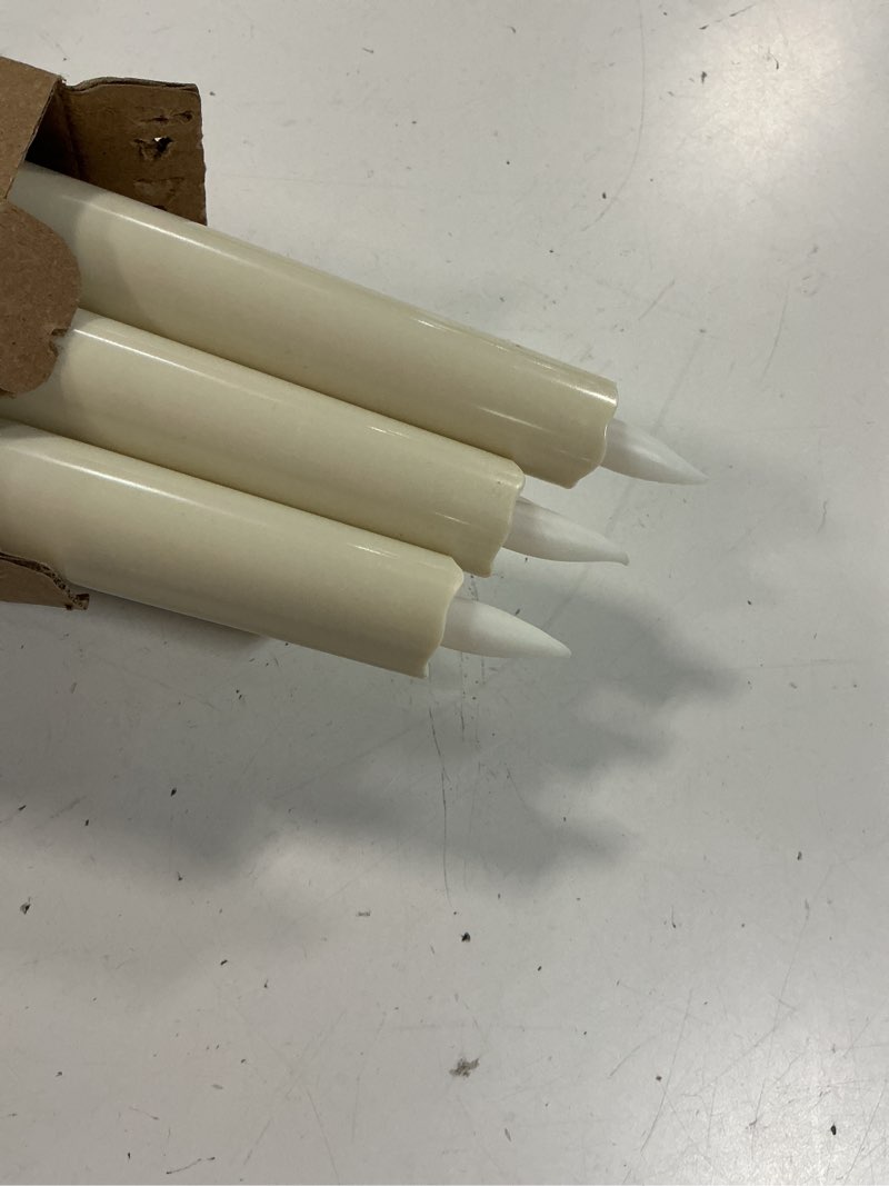 Condition photo showing Good Condition for homemory 12 pcs waxy flameless taper candles with remote, led flameless candlesticks classic tall candle, flickering battery operated taper candles for bedroom, dining room, ivory, 9.6 inches c-12 pcs ivory