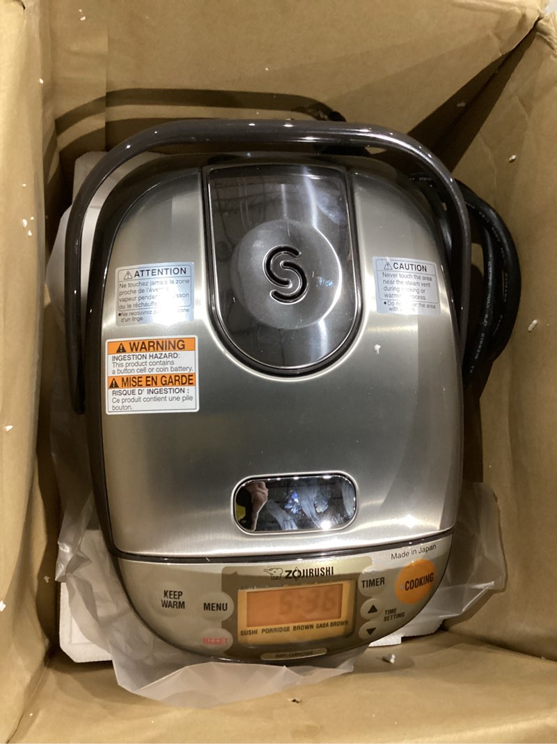 Condition photo showing Good Condition for Zojirushi NP-GBC05XT Induction Heating System Rice Cooker and Warmer, 0.54 L, Stainless Dark Brown Stainless Dark Brown Cooker and Warmer
