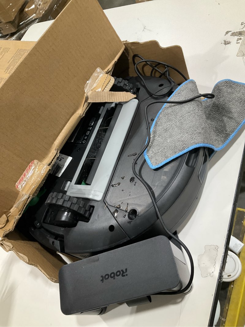 Condition photo showing As Is for iRobot Roomba Robot Vacuum and Mop Combo (Y0140) - Vacuums & mops, Easy to use, Power-Lifting Suction, Multi-Surface Floors, Smart Navigation, Cleans in Neat Rows, Self-Charging, Bagless, Space-Saving Roomba Y0140