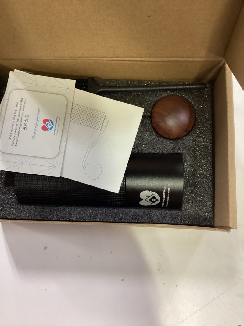 Condition photo showing As Is for cozynest home essentials hand held stainless steel manual coffee grinder  black  with adjustable coarseness setting; brand new.