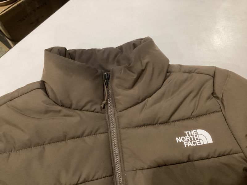 Condition photo showing Good Condition for THE NORTH FACE Women's Aconcagua 3 Jacket | Wind Resistant, Water Repellent, 600 Fill Waterfowl Down Insulation Small Mars Dust, NECKLINE STAINED, AS IS