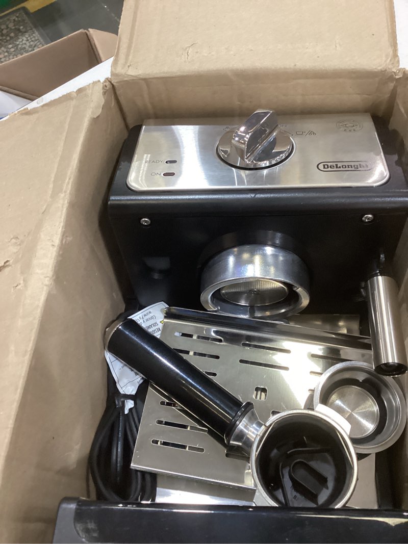 Condition photo showing As Is for de'longhi 15-bar pump espresso machine with milk frother & temperature control - compact home barista coffee maker for espresso, latte, cappuccino & iced coffee, easy to clean design black/stainless steel