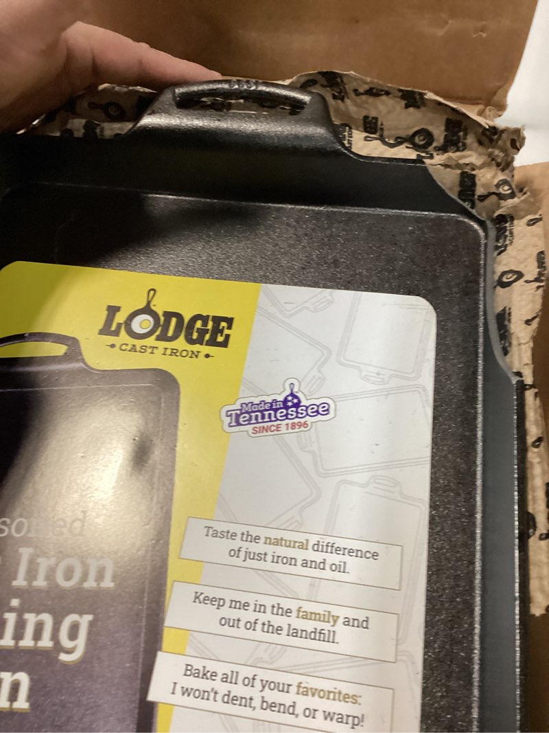 Condition photo showing As Is for Lodge Cast Iron Baking Pan