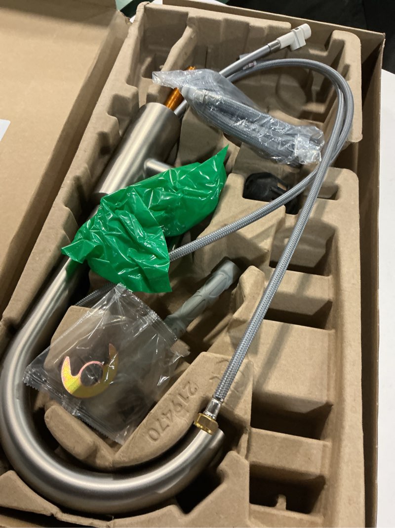 Condition photo showing As Is for Moen Riley Spot Resist Stainless One-Handle Pulldown Kitchen Faucet Featuring Power Boost and Reflex Docking System for the Spray Head, Modern Kitchen Sink Faucet, 7402SRS