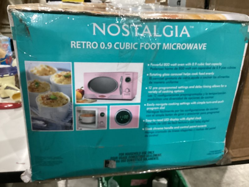 Condition photo showing New/Like New for Nostalgia Retro Countertop Microwave Oven - Large 800-Watt - 0.9 cu ft - 12 Pre-Programmed Cooking Settings - Digital Clock - Kitchen Appliances - Pink Retro Classic 0.9 Cu. Ft. Pink