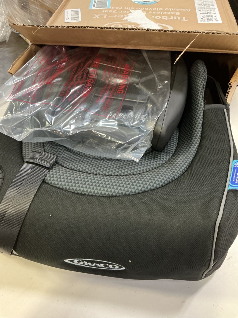 Condition photo showing New/Like New for Graco® TurboBooster® LX Backless Booster with Affix Latch | Backless Booster Seat for Big Kids Transitioning to Vehicle Seat Belt (Rio)