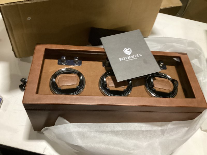 Condition photo showing New/Like New for ROTHWELL Triple Watch Winder for Automatic Watches with Quiet Motor with Multiple Speeds and Rotation Settings (Tan/Brown)