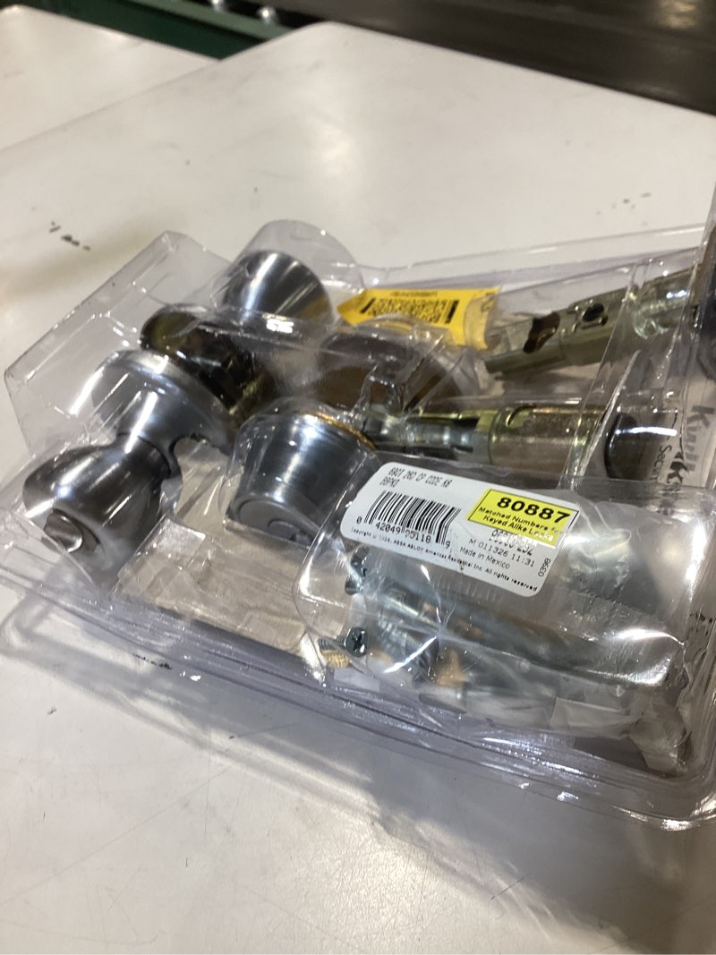 Condition photo showing As Is for kwikset tylo satin chrome deadbolt and entry door knob 1-3/4 in.