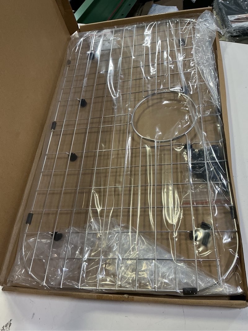 Condition photo showing New/Like New for serene valley sink protector grid 26-1/16" x 14-1/16", rear drain with corner radius 3-1/2", 304 stainless steel material nlw2614r