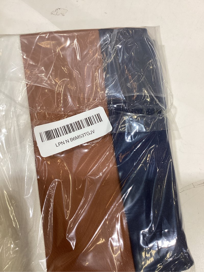 Condition photo showing New/Like New for 2 pack 18x18 inch throw pillow covers, brown faux leather & navy blue white cotton canvas, double-sided decorative pillow case for sofa couch coastal & nautical decor (no insert) 18" x 18" (pack of 2) navy blue