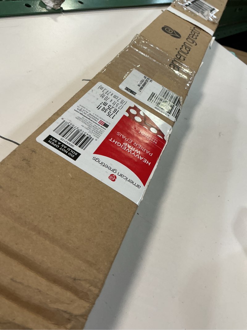 Condition photo showing Good Condition for American Greetings Jumbo Reversible Red Wrapping Paper Roll for Christmas, Valentine's Day or Any Occasion (175 sq. ft., 1 Extra Large Roll-30 in. x 70 ft.) White Polka Dots Solid Red and White Polka Dots