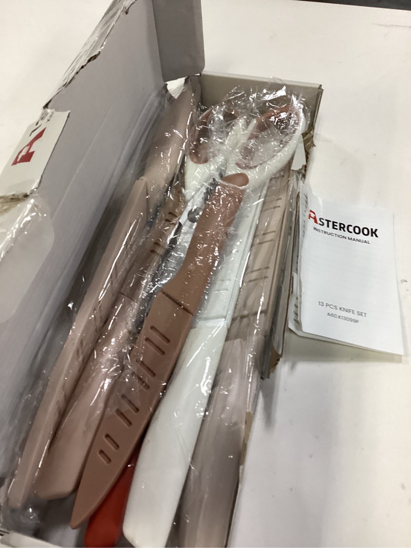Condition photo showing Good Condition for Astercook Knife Set, 13 Pieces Kitchen Knives Set with Healthy Anti-Rust Coating, Dishwasher Safe, Stainless Steel Chef Knife Sets with 6 Blade Guards, Perfect Valentine's Day Gifts for Kitchen Cream Large