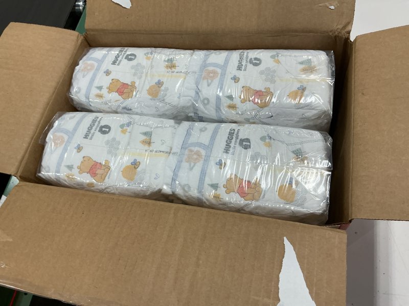 Condition photo showing New/Like New for Huggies Size 1 Diapers, Little Snugglers Baby Diapers, Size 1 (8-14 lbs), 96 Count, Packaging May Vary Size 1 96