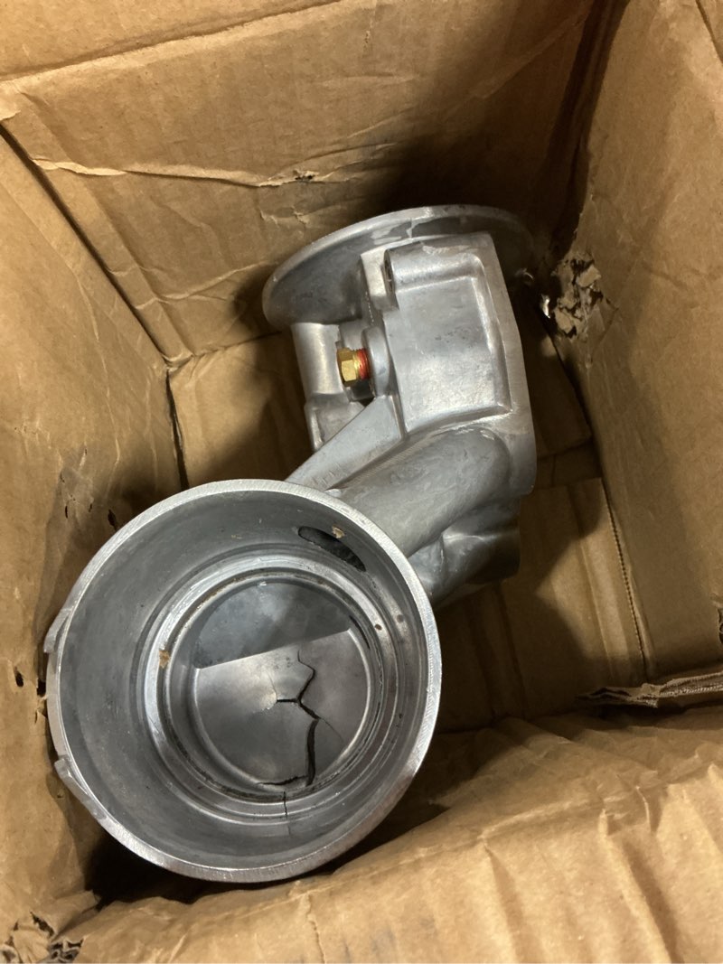 Condition photo showing As Is for dorman 904-408 engine oil cooler mount compatible with select ford models