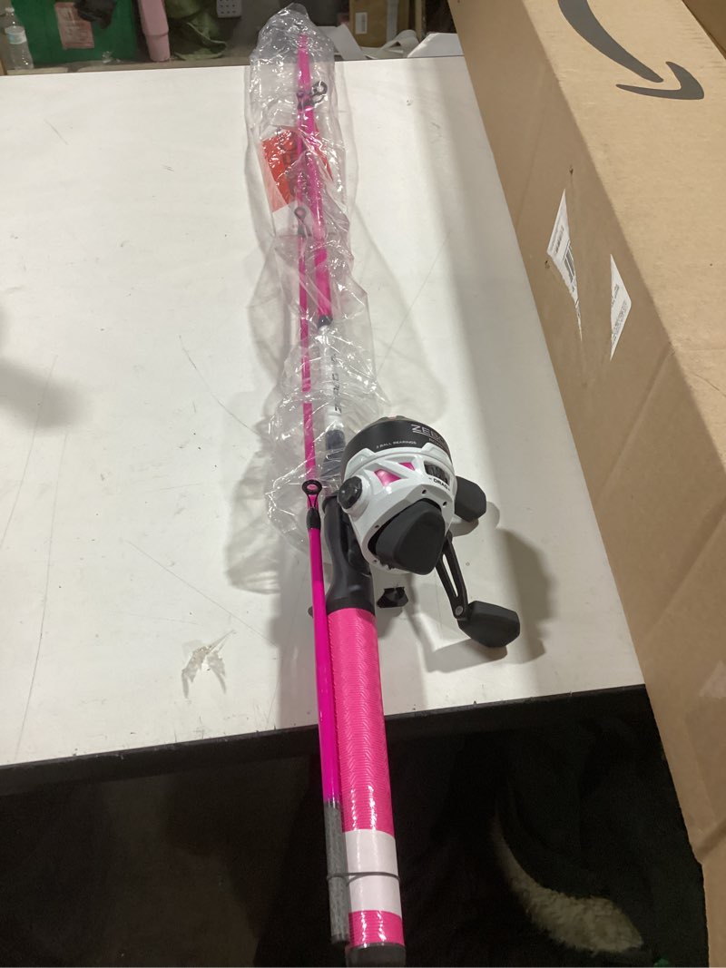 Condition photo showing As Is for Zebco Roam Spincast Reel and Fishing Rod Combo, 6-Foot 2-Piece Fiberglass Fishing Pole with ComfortGrip Handle, Quickset Anti-Reverse Fishing Reel, Pre-Spooled with 10-Pound Zebco Line Pink