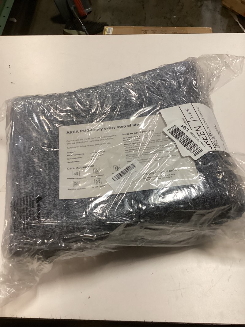 Condition photo showing New/Like New for FinRe?c 5x7 Washable Area Rugs for Bedroom Living Room, Low Pile Thin Rug Solid Color, Non-Slip Carpet Indoor for Home Decor (Navy Blue) Navy Blue 5' x 7' (Rectangular)