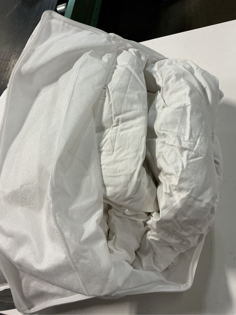 Condition photo showing As Is for premium down comforter, king/cal king, down