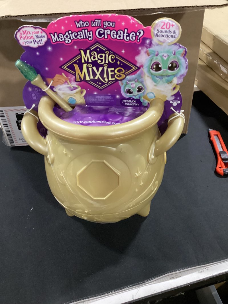 Condition photo showing New/Like New for magic mixies - magical real misting gold cauldron with 8 inch non-electronic plush toy. follow the spell book add the magic ingredients. who will you magically create? blue non-electronic plush