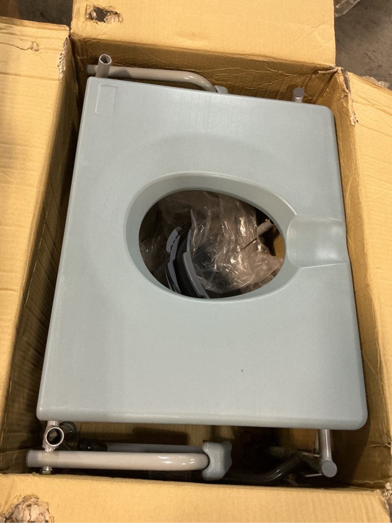 Condition photo showing As Is for homecraft deluxe bariatric drop arm commode, 1000 lb weight capacity, extra wide seat with adjustable height, bedside or over toilet use, drop arms for easy transfers, includes splash guard & bucket professional healthcare