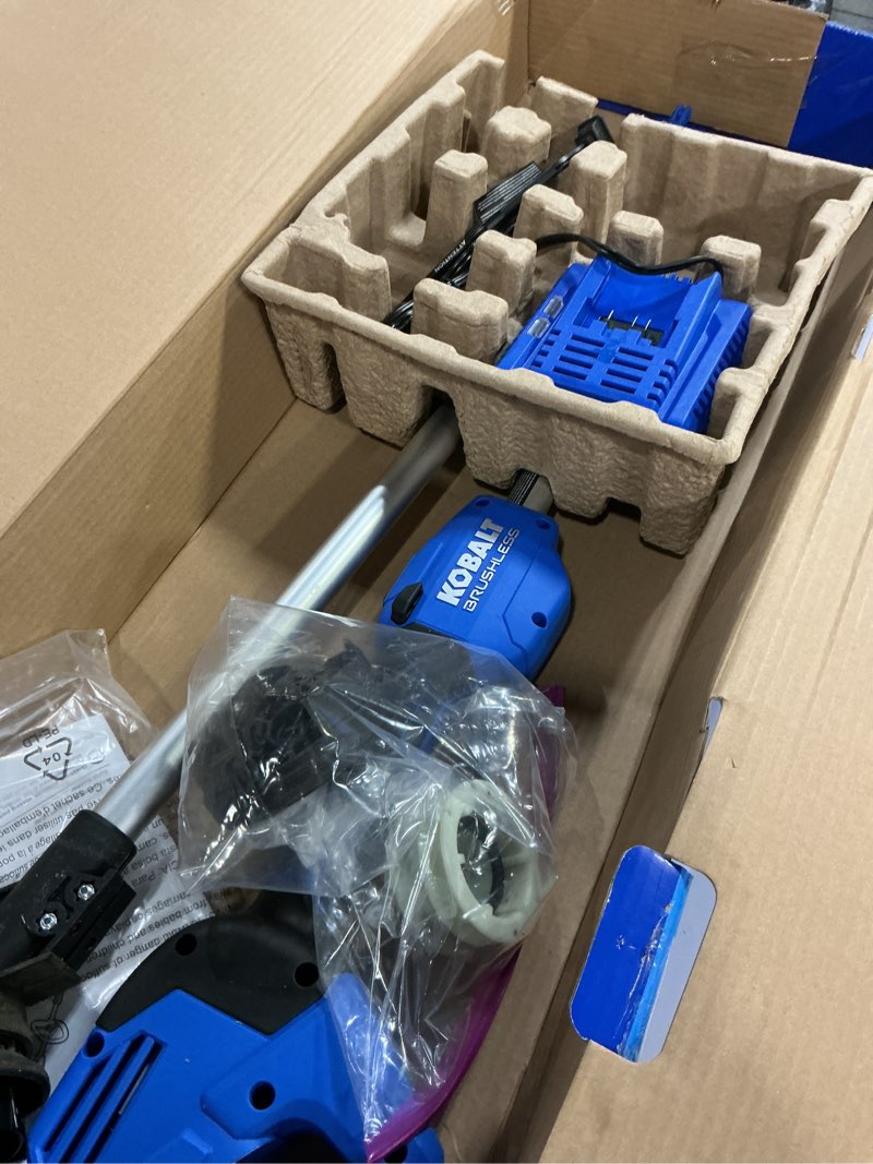 Condition photo showing As Is for kobalt 24-volt 14-in straight shaft battery string trimmer 4 ah (battery and charger included)