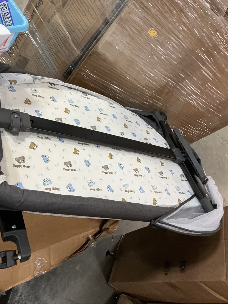Condition photo showing As Is for baby bassinet, 3 in 1 bedside bassinets for baby, bassinet bedside sleeper with wheels, adjustable height with rocking mode, breathable mesh, storage basket, easy assemble & folding (dark gray)