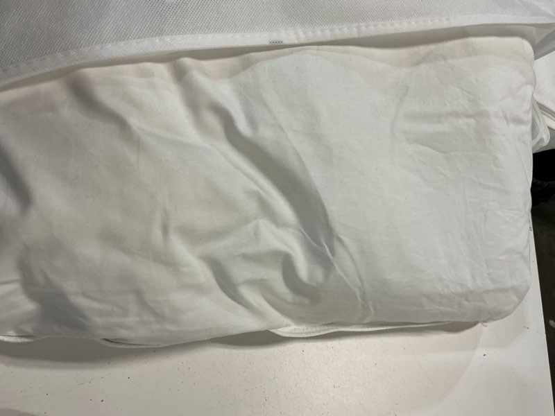 Condition photo showing New/Like New for premium down pillow, standard, medium