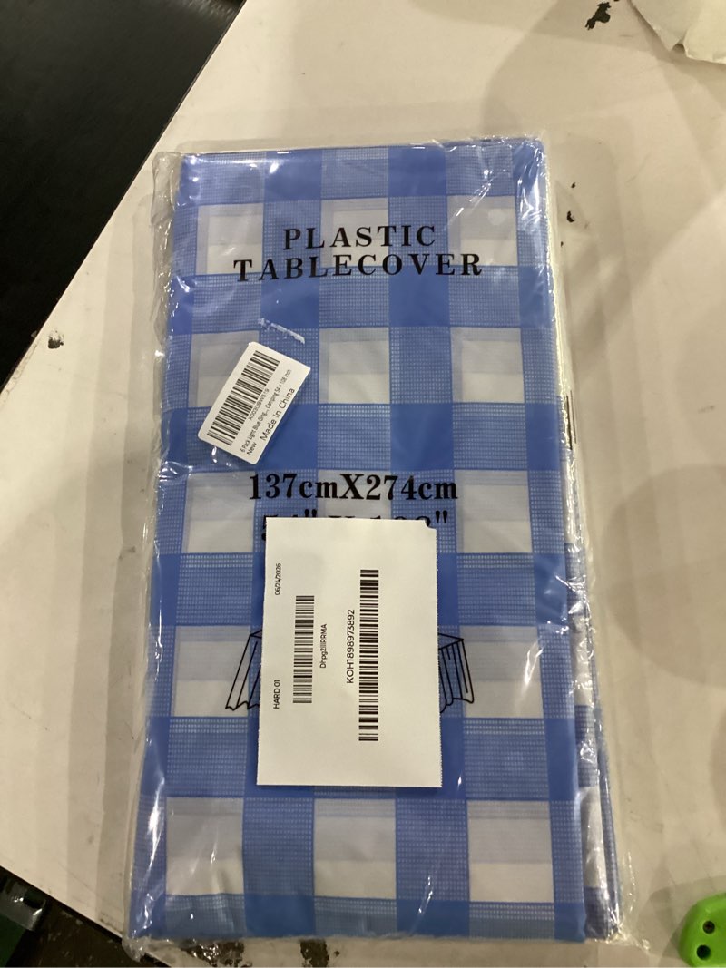 Condition photo showing New/Like New for 6 pack light blue gingham tablecloth rectangular pale blue and white checkered tablecloths disposable plastic plaid table cover for parties, outdoor picnic, birthday, wedding, camping 54 × 108 inch light blue gingham 6 pack
