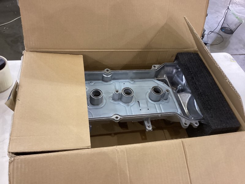Condition photo showing As Is for TRQ Valve Cover Compatible with 2012-2019 Nissan Versa 2014-2019 Versa Note VCA81784