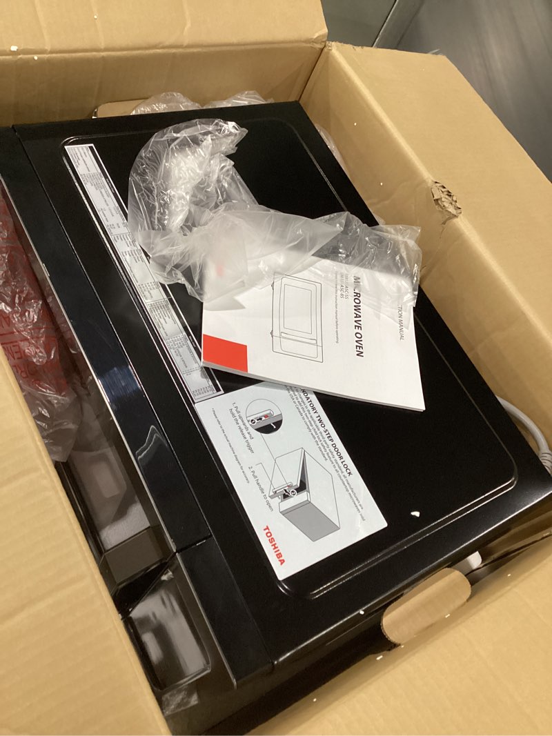 Condition photo showing As Is for TOSHIBA EM131A5C-BS Countertop Microwave Ovens 1.2 Cu Ft, 12.4" Removable Turntable Smart Humidity Sensor 12 Auto Menus Mute Function ECO Mode Easy Clean Interior Black Color 1000W 1.2 Cu.ft