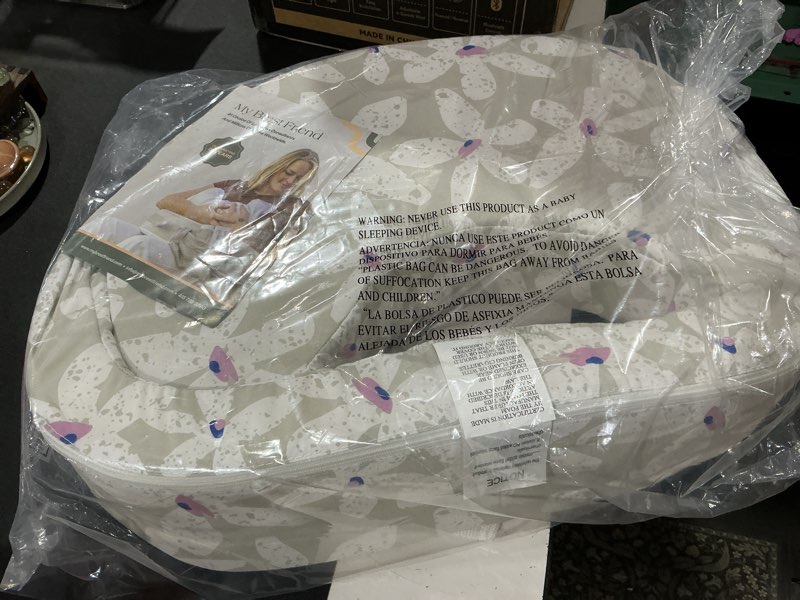 Condition photo showing Good Condition for nursing pillow for breastfeeding & bottle feeding, ergonomic c-shape feeding support pillow for caregiver, removable cotton cover, original size (leaves)