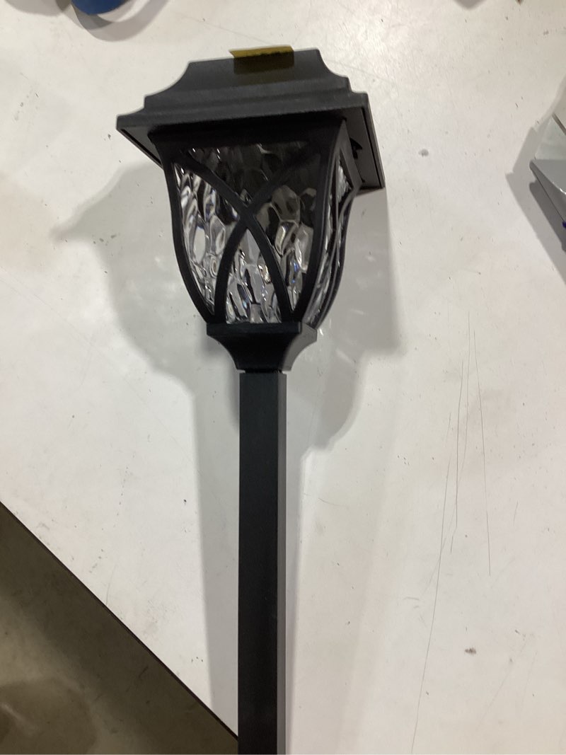 Condition photo showing As Is for gigalumi 5 -lumens black solar led outdoor path light with dusk-to-dawn sensor 3000-k incomplete ,similar item
