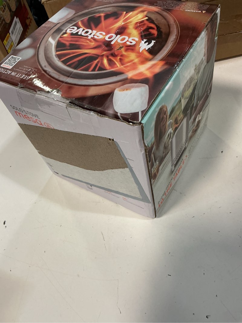 Condition photo showing New/Like New for solo stove mesa xl, 7 inch tabletop fire pit with stand - smokeless, stainless steel fire pit for camping, outdoor & patio- wood burning or pellet fueled portable bonfire, 2.3lbs, stainless steel mesa xl stainless steel