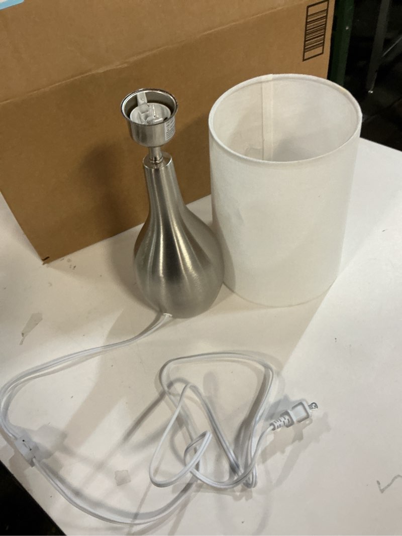 Condition photo showing As Is for Simple Designs LT3303-BSN 1 Light Tear Drop Table Lamp, Brushed Nickel, 7 x 7 x 19.5 Brushed Nickel 1