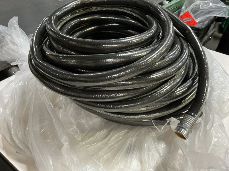Condition photo showing As Is for neverkink teknor apex 5/8-in x 100-ft heavy-duty kink free vinyl gray coiled hose