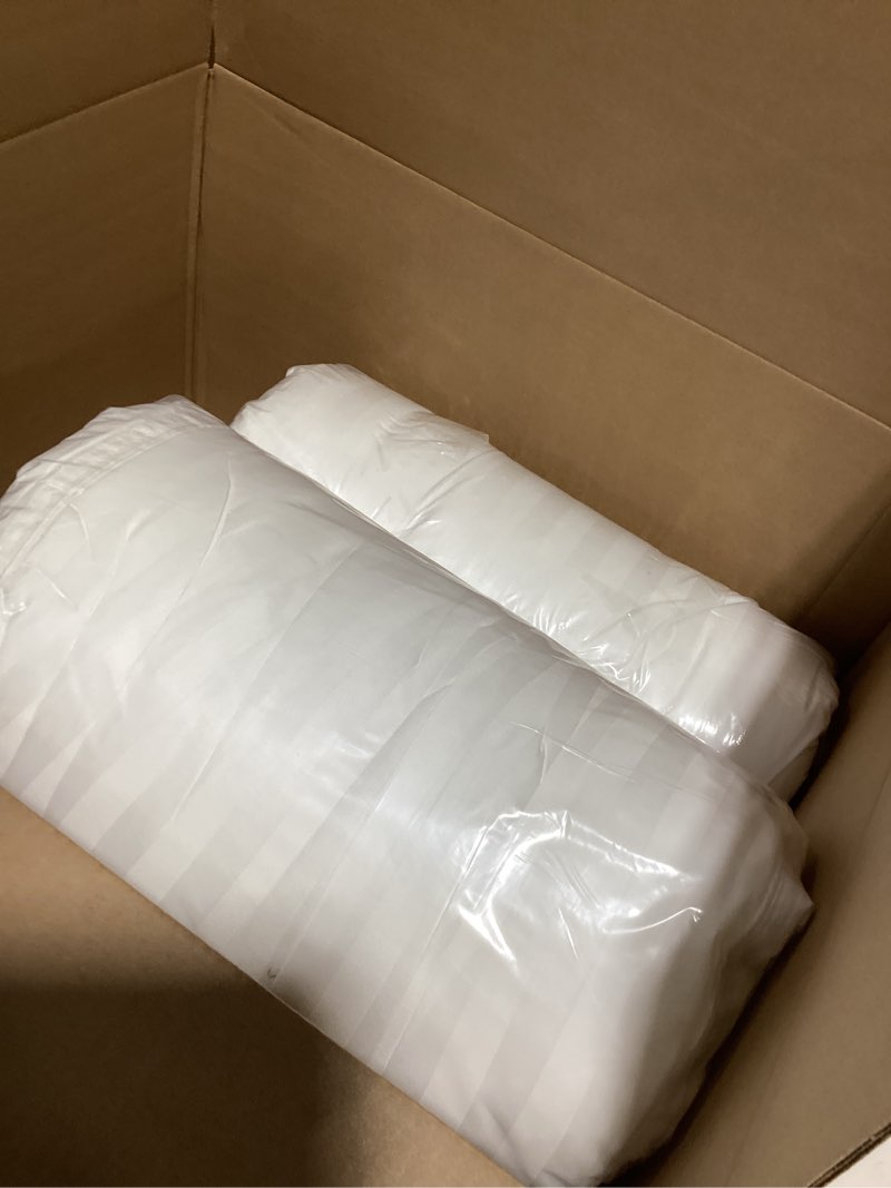 Condition photo showing New/Like New for King Size Pillows Set of 2– Soft Yet Supportive Down Alternative Pillows for Side & Back Sleepers – Hotel-Quality Down Pillow Feel – Firm Support for Neck & Back – Set of 2 King (Pack of 2)