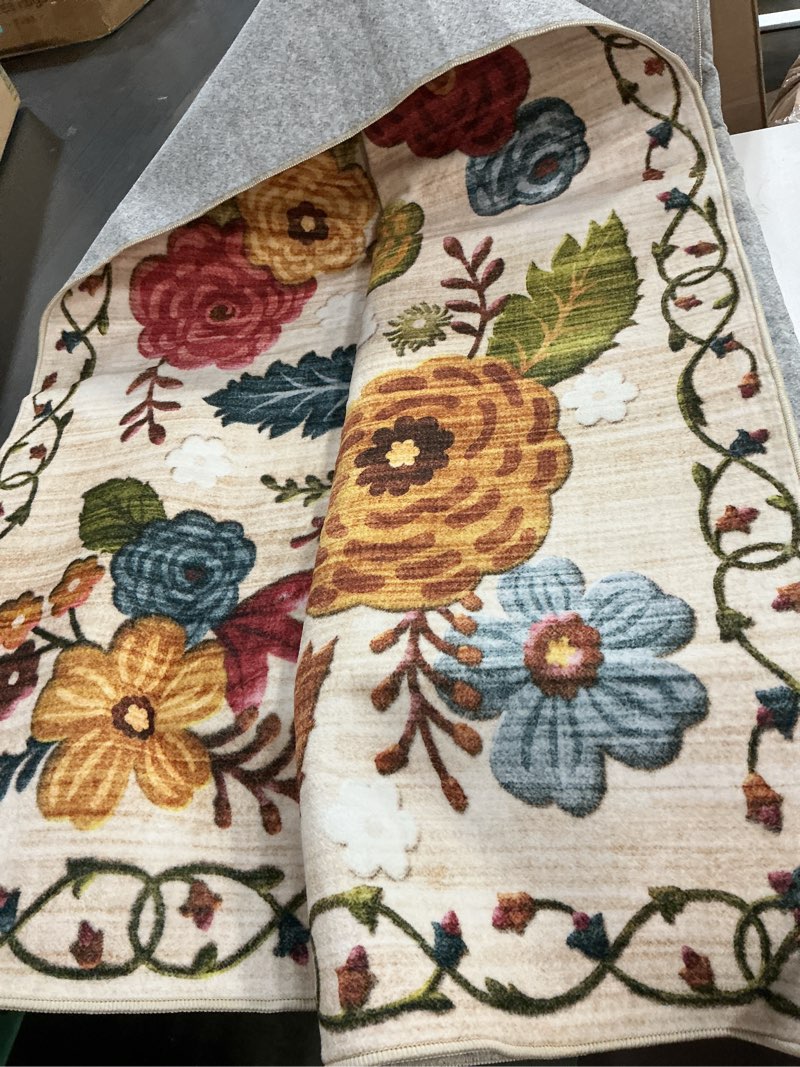Condition photo showing Good Condition for (Similar)5x8 Machine Washable Area Rug for Living Room, Beige Vintage Boho Floral Rug Large Non-Slip Low Pile Soft Faux Wool Carpet, Kids and Pets Friendly for Bedroom Dining Room Farmhouse Home Decor Rug Multi-color Beige 5' x 8' (Rectangular)