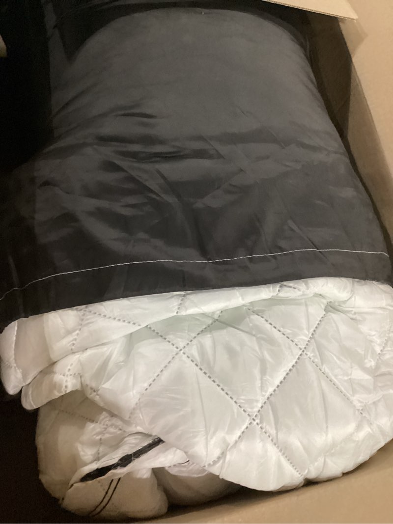 reversible quilted furniture protector or couch cover in black and white(product info unknown)