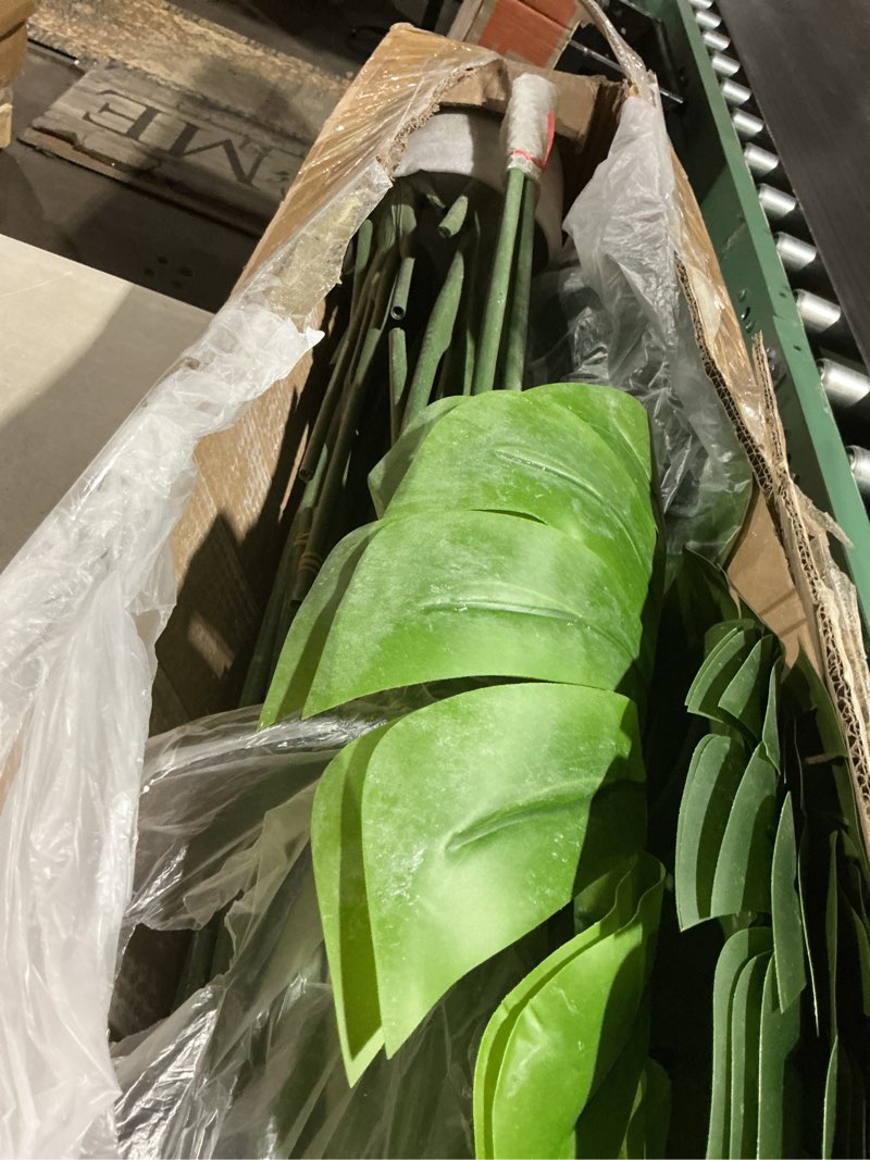 Condition photo showing As Is for aveyas 4ft tall artificial monstera deliciosa plants, 4 feet faux swiss cheese plants fake silk tree with pot for indoor outdoor office house living room home decor (4 ft tall including raised pot)
