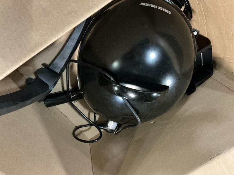 Condition photo showing As Is for george foreman indoor/outdoor electric patio grill, apartment approved, 15-serving, removable stand, black electric grill black