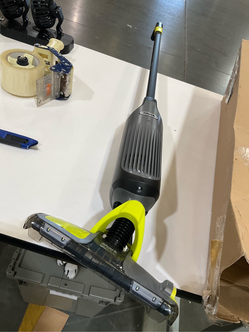 Condition photo showing As Is for shark vacmop cordless hard floor cleaner, vacuum and spray mop, powerful suction, lightweight, led headlights, includes 4 disposable pads, 12oz multi-surface cleaning solution, gray, vm252