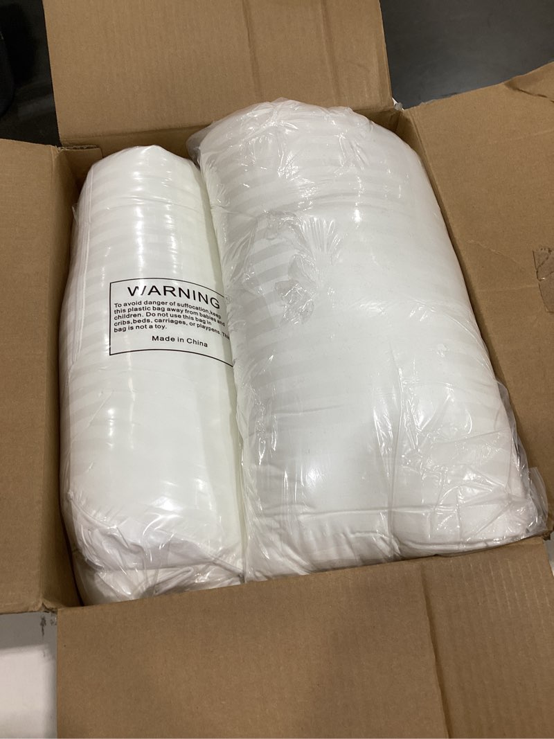 this product is a 2-pack of king size down alternative pillows from the beckham hotel collection.