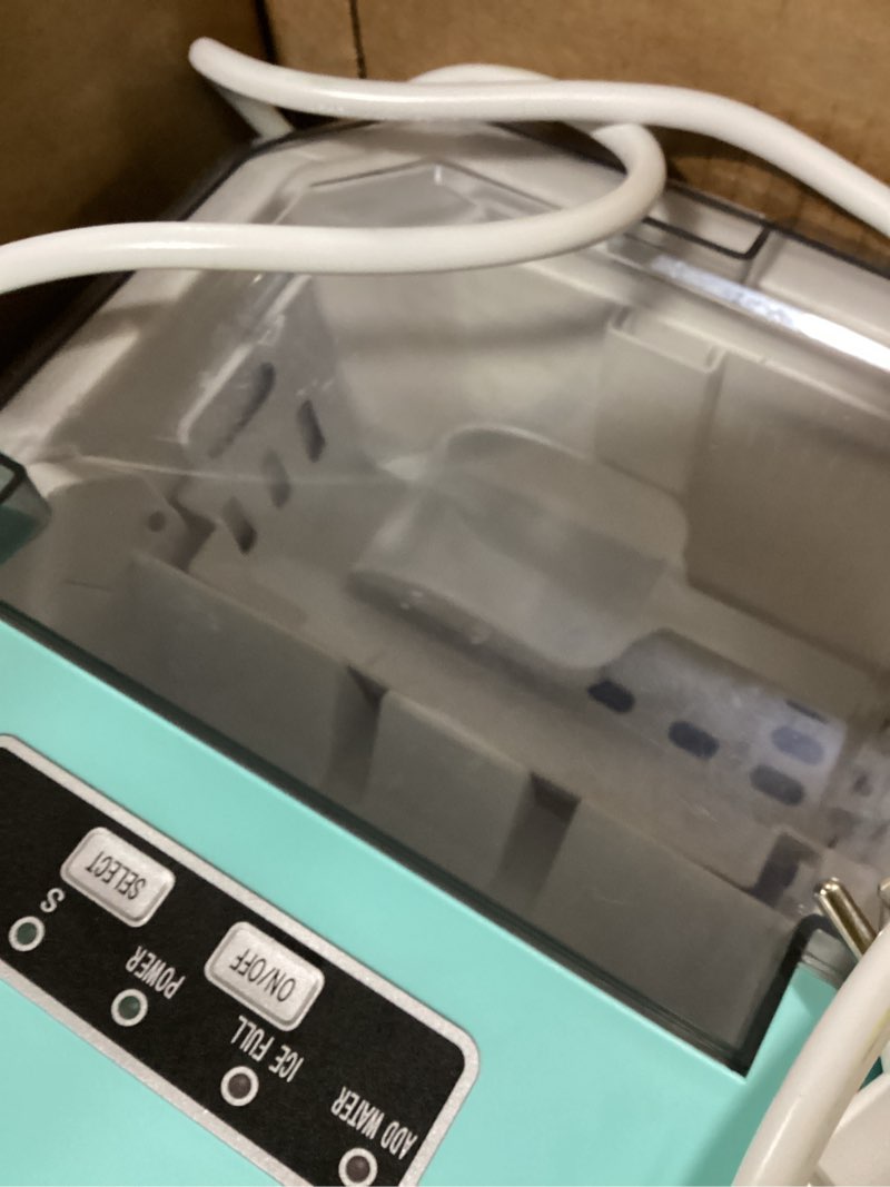 Condition photo showing New/Like New for ZAFRO Countertop Ice Maker, 26.5Lbs/24H, 9 Bullet Cubes in 6 Mins, Self-Cleaning Portable Ice Machine with 2 Ice Sizes (S/L), Quiet Compact Design, Double Handles, for Home, Party, RV, Camping, Green